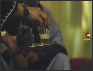 تصویری از یک ساتکان و نلبکی چای